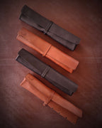 Quatre trousse de rangement en cuir 