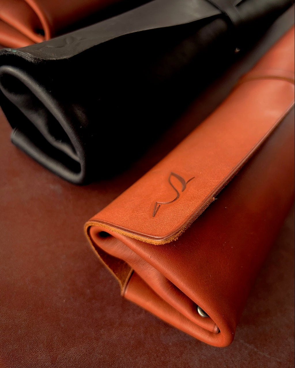 Deux trousse de rangement en cuir 